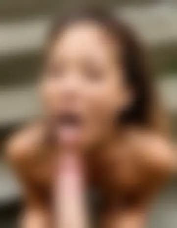 Leah receives a facial cumshot on a narrow stairwell.