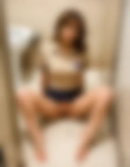 Abigail in a grimy convenience store bathroom.